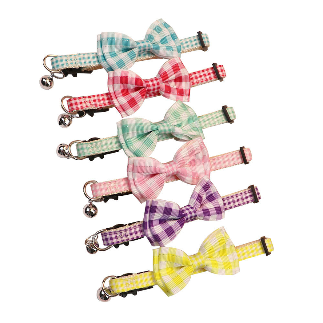 Six colorful gingham bow cat collars with bells on a white background
