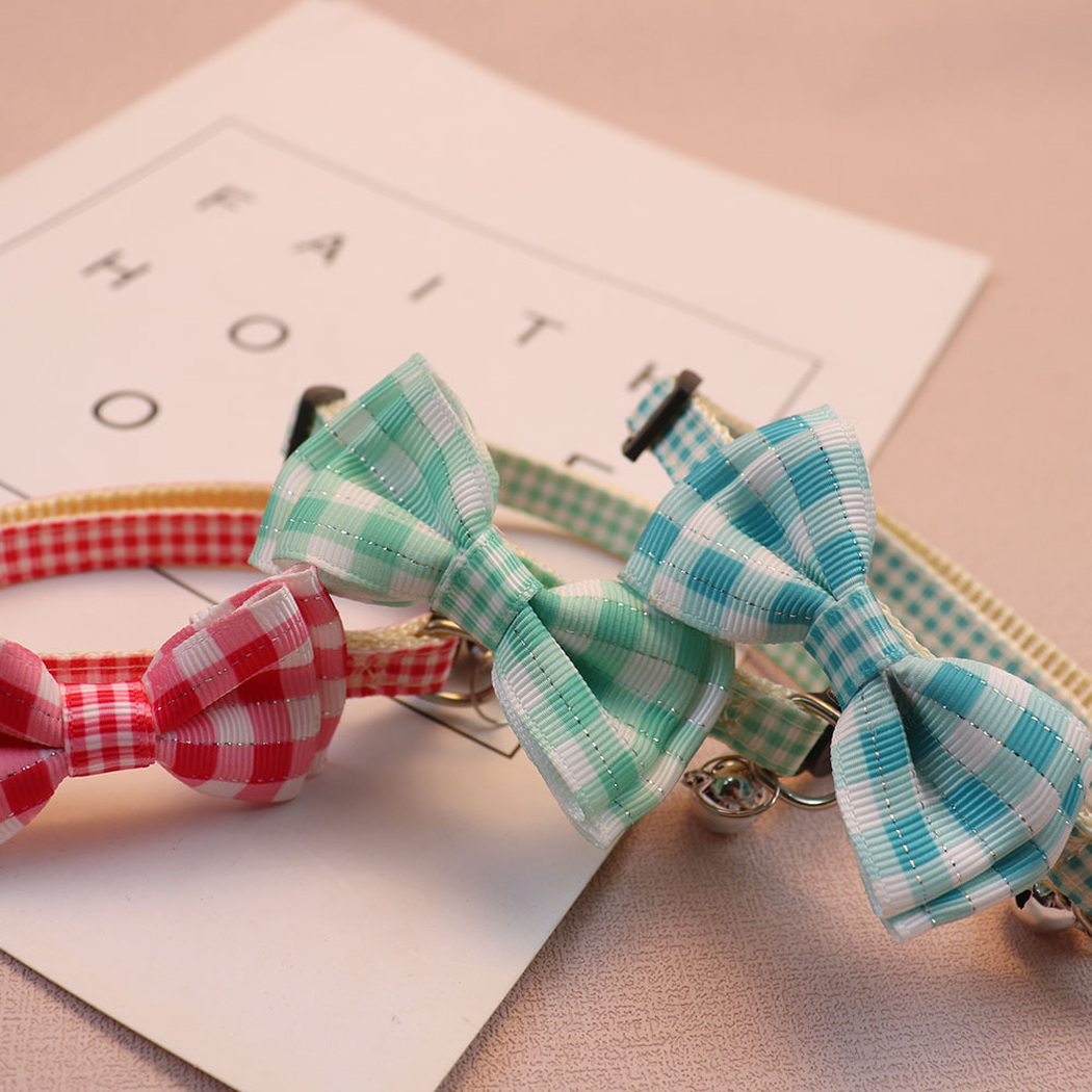 Close-up of checked bow ribbons with fine metallic thread accents