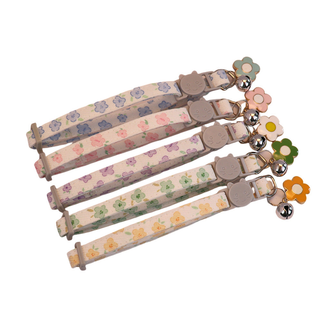 Five floral cat collars with matching bells and colorful flower charms