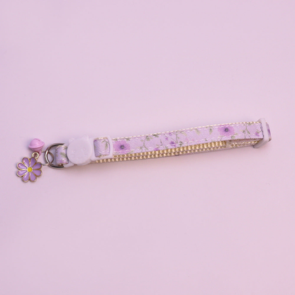 Light purple floral cat collar with bell and flower charm