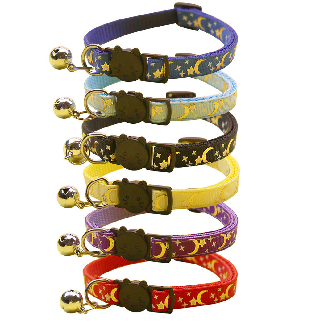 Six moon and star cat collars with bells displayed together