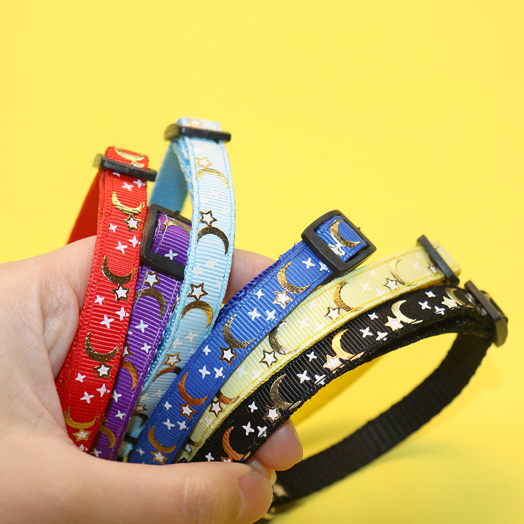 Assorted moon and star cat collar straps held together
