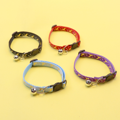 Four moon and star cat collars arranged in loops