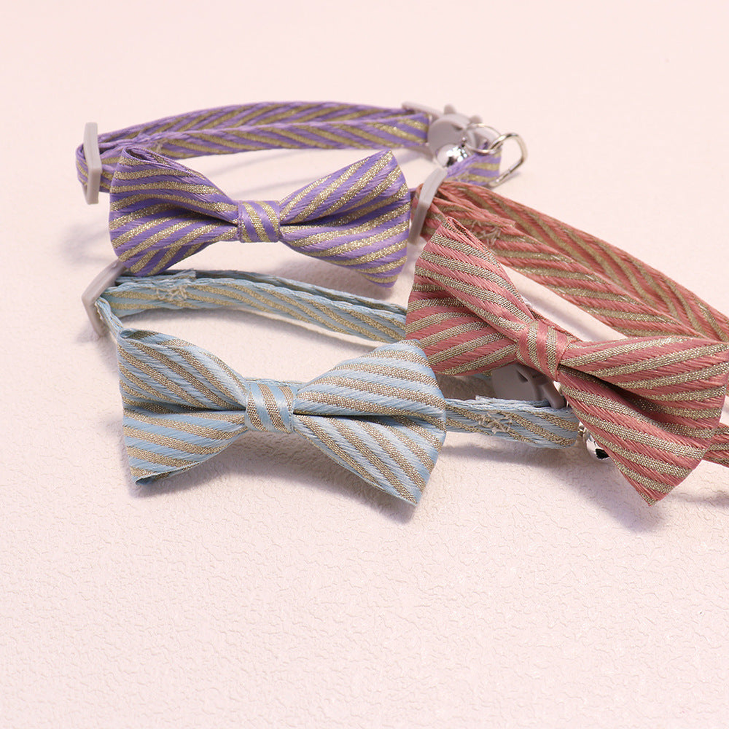 Light blue, purple and dusty pink striped bow cat collars grouped together