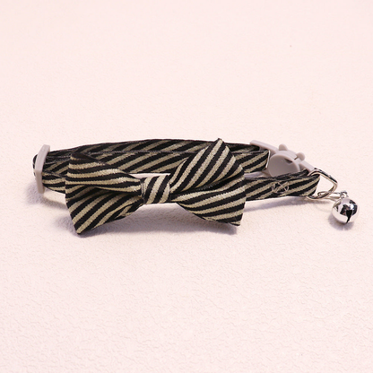 Black striped bow cat collar with bell and cat-face buckle