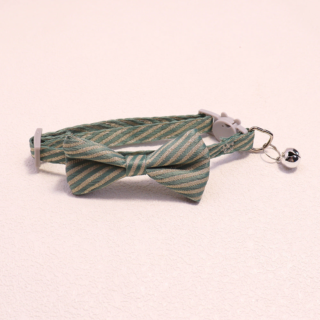 Mint green striped bow cat collar with bell and cat-face buckle