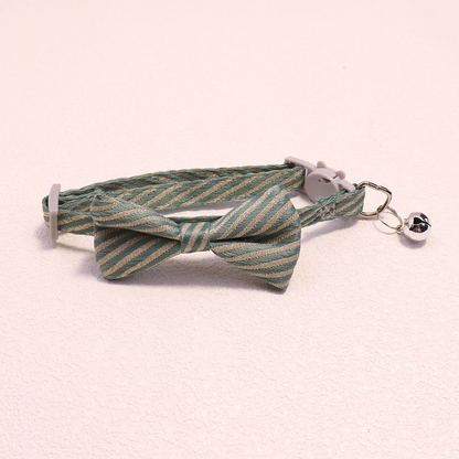 Mint green striped bow cat collar with bell and cat-face buckle