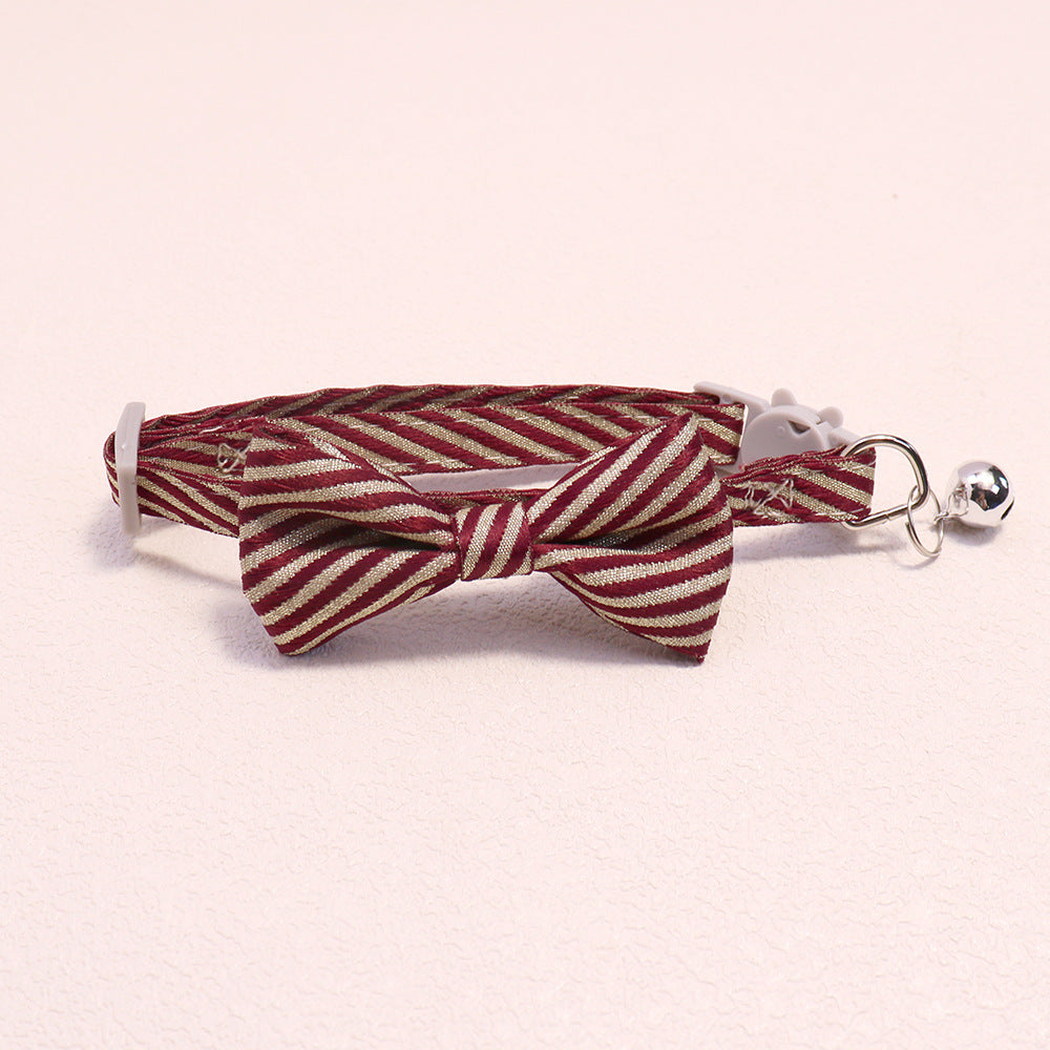 Burgundy striped bow cat collar with bell and cat-face buckle