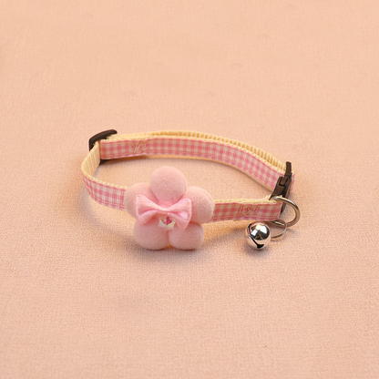 Light pink gingham cat collar with flower bow and bell