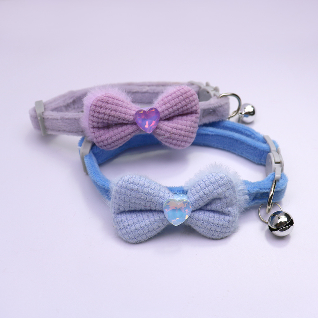 Light purple and blue bow cat collars with heart accents and bells