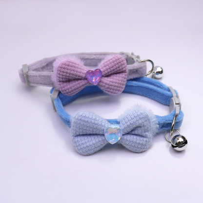 Light purple and blue bow cat collars with heart accents and bells