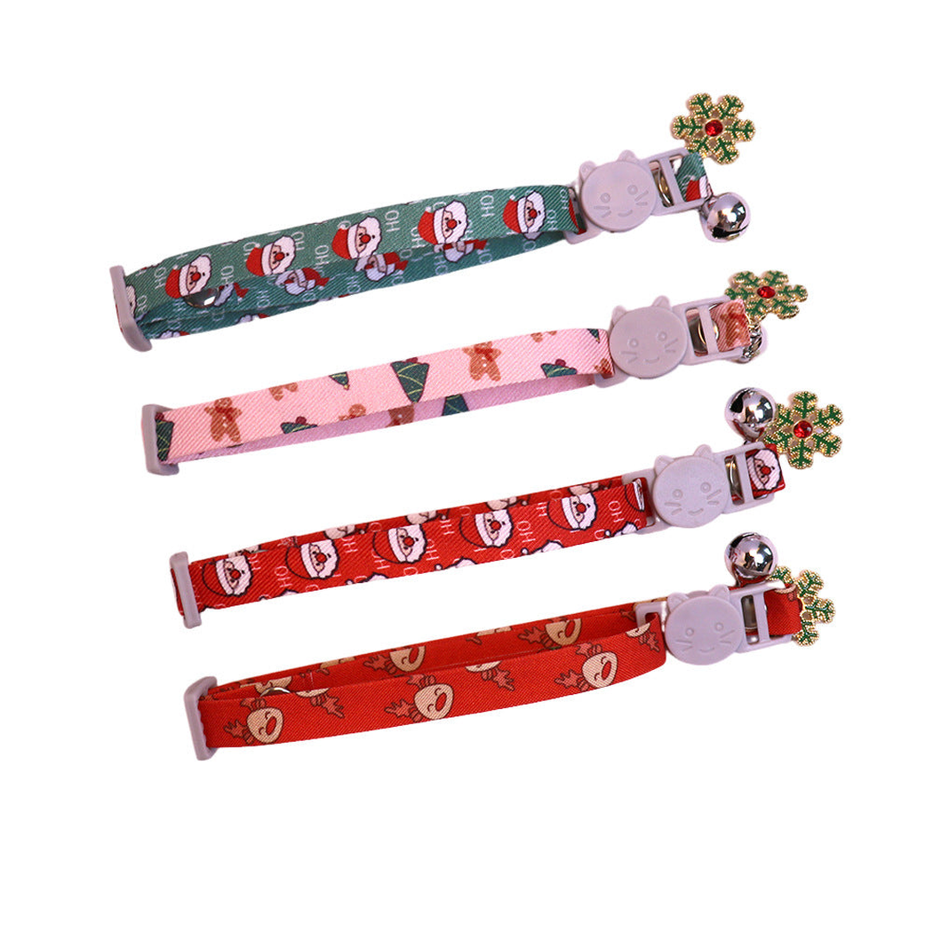 Four Christmas-pattern cat collars with cat-face buckles, bells and snowflake charms