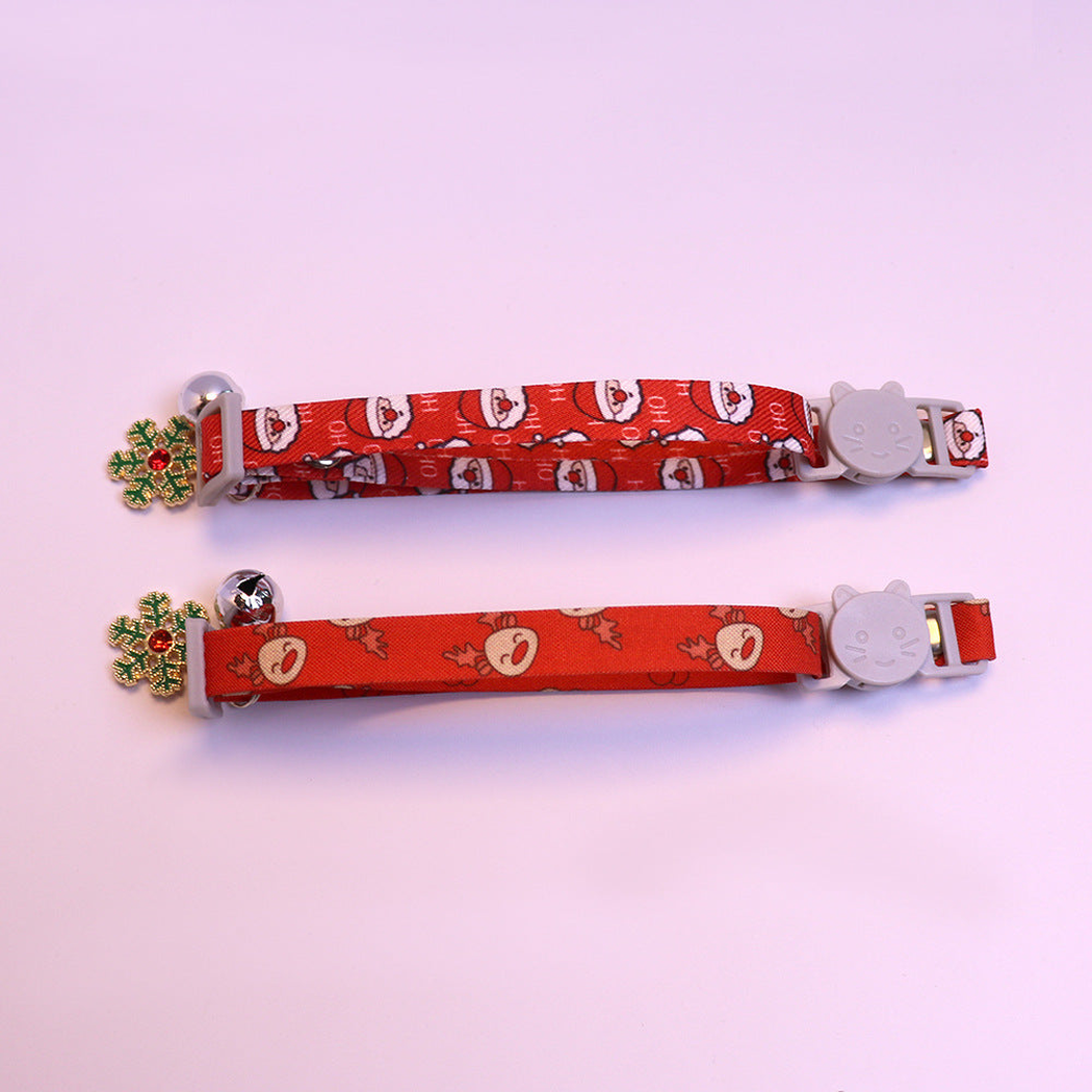 Red Santa and reindeer cat collars displayed together
