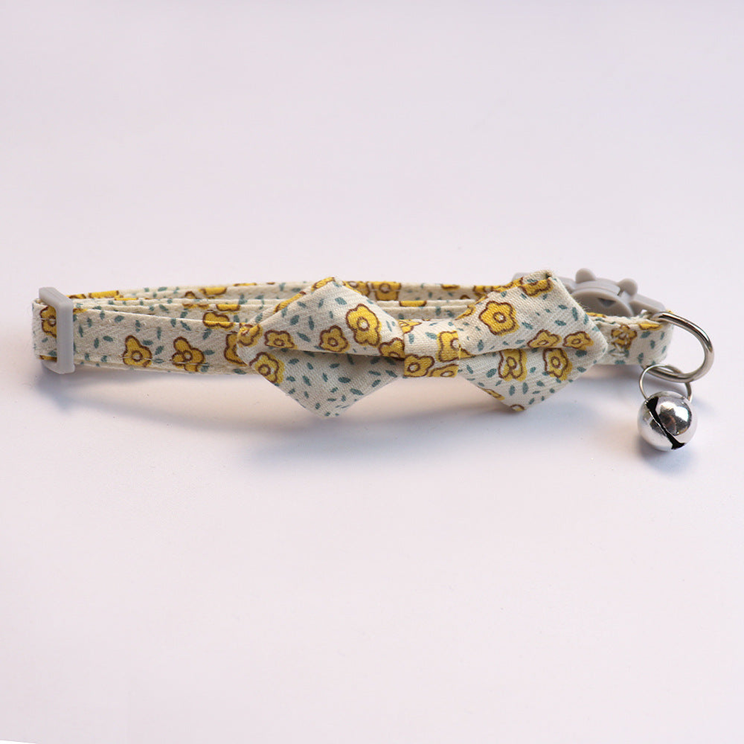 Yellow floral cat collar with bow and silver-tone bell