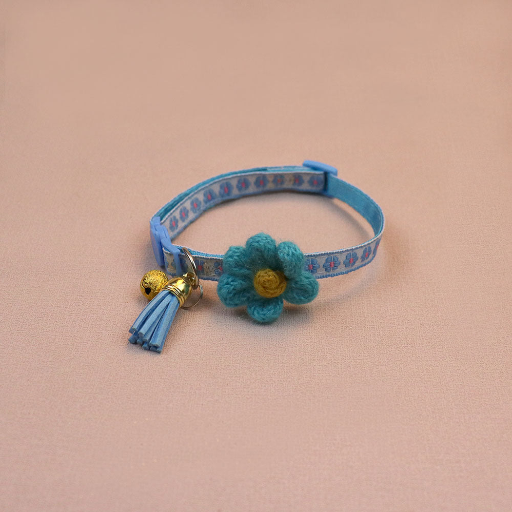 Blue floral cat collar with raised flower, bell and tassel