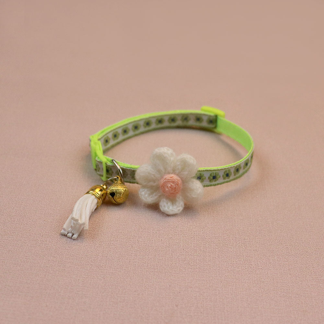 Green floral cat collar with raised flower, bell and tassel