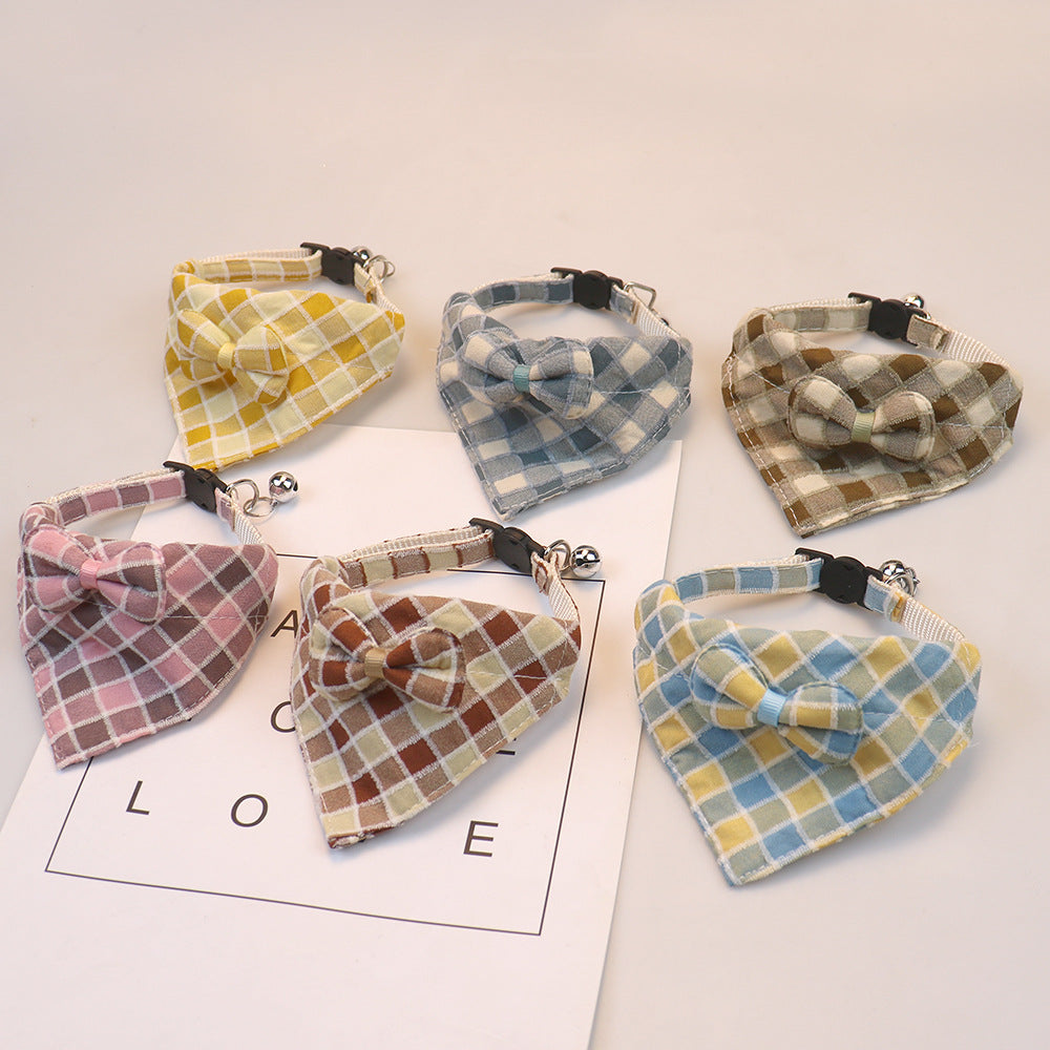 Six plaid bow cat collars displayed together