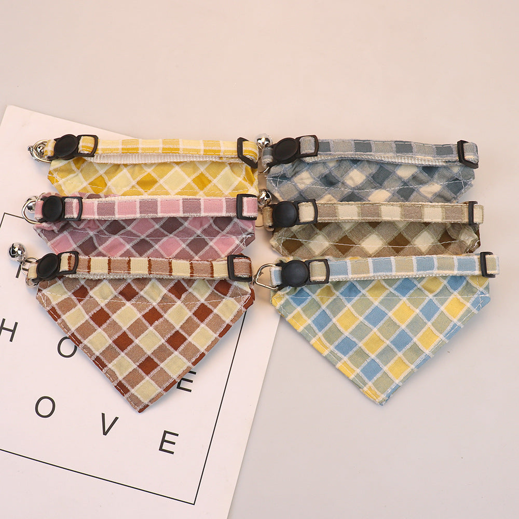 Back view of six plaid bow cat collars with adjustable straps