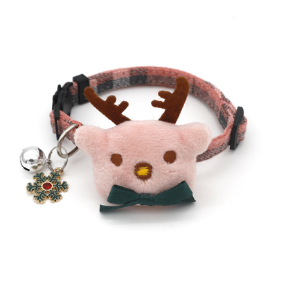 Light pink plaid reindeer cat collar with green bow, bell and snowflake charm