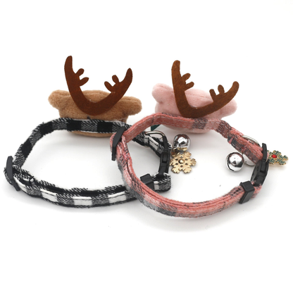 Rear view of pink and black-and-white plaid reindeer cat collars with adjustment hardware