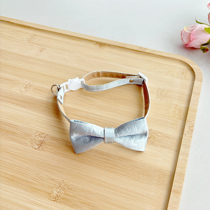 Light blue cat collar with tonal bow and cat-face buckle