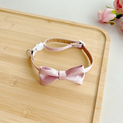Blush pink cat collar with tonal bow and cat-face buckle