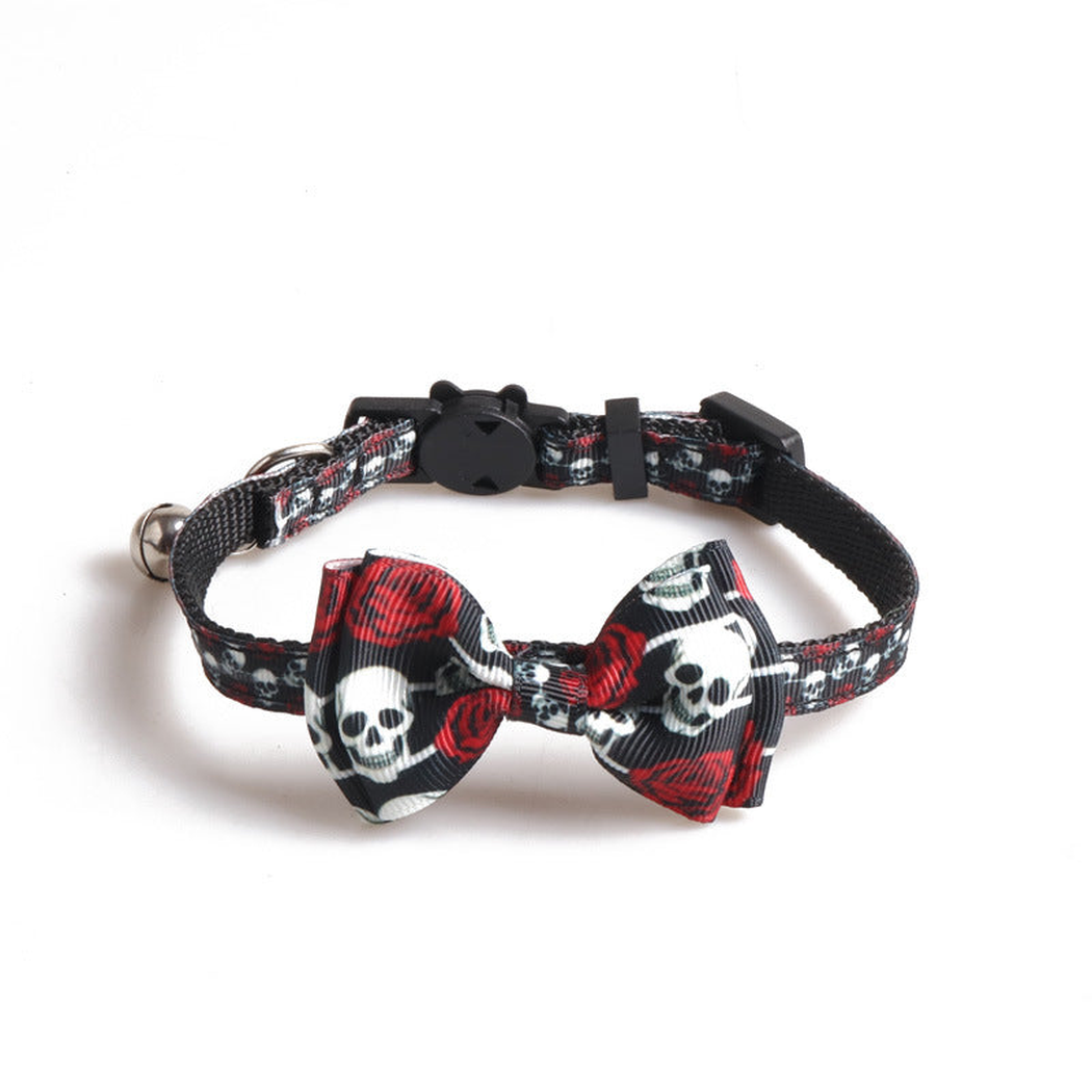 Black cat collar with skull-and-rose print, bow and bell