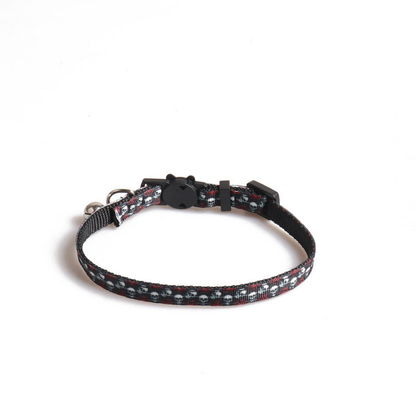 Black cat collar with skull-and-rose print, cat-face clasp and bell