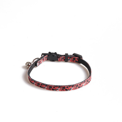 Red Halloween-print cat collar with cat-face clasp and bell
