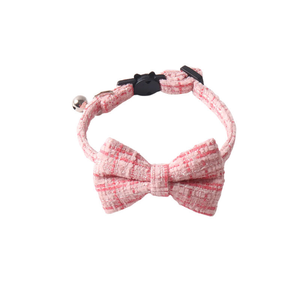 Pink textured cat collar with bow, bell and cat-face buckle