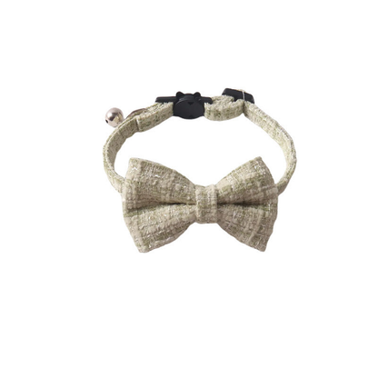 Green textured cat collar with bow, bell and cat-face buckle