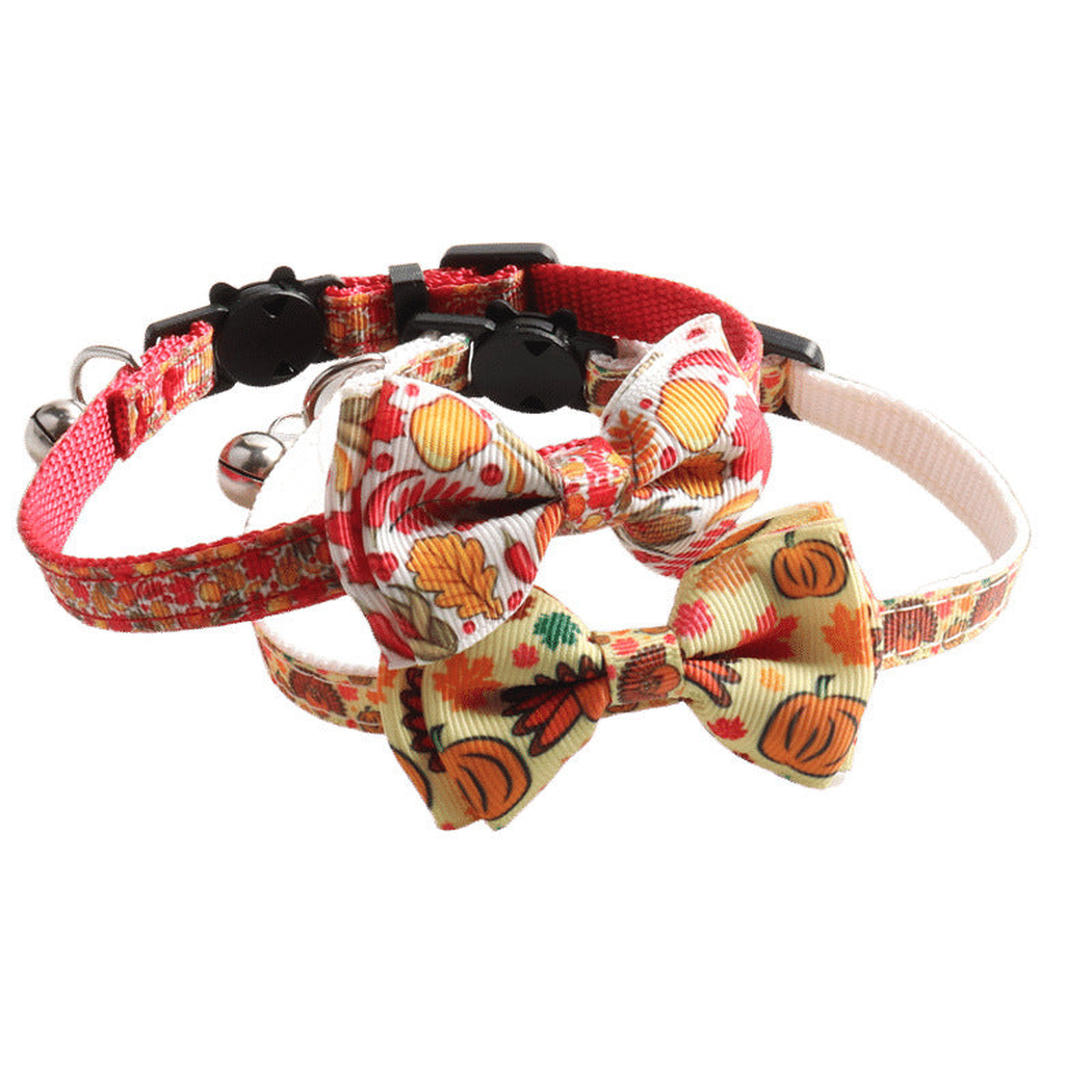 Three autumn-print bow cat collars displayed together