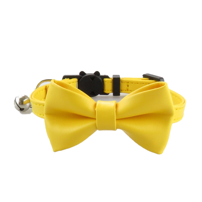 Yellow bow cat collar with bell, front view