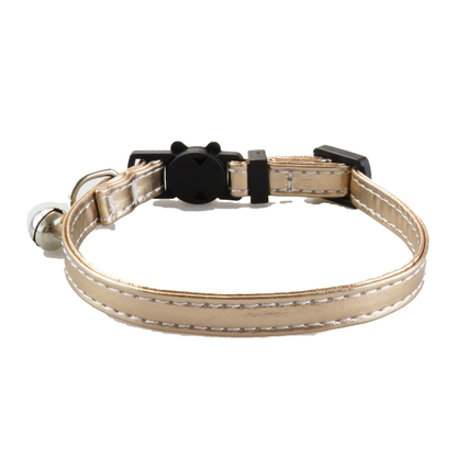 Plain gold-tone cat collar with stitched edges and bell