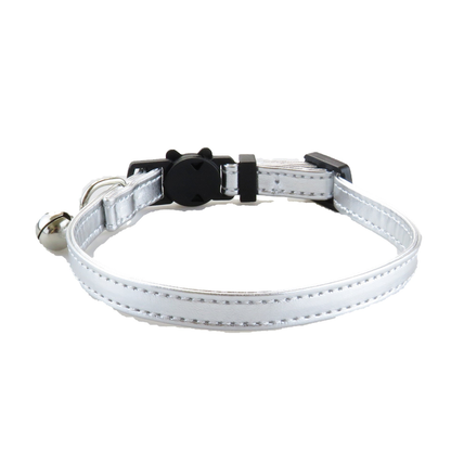 Plain silver-tone cat collar with stitched edges and bell