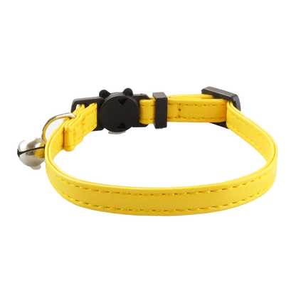 Plain yellow cat collar with stitched edges and bell