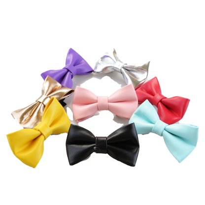 Bow cat collars arranged together in eight colors