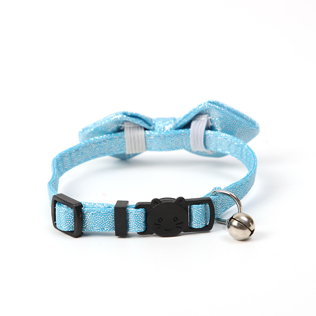 Light blue glitter bow cat collar showing the cat-face buckle, adjustment slider, D-ring and bell