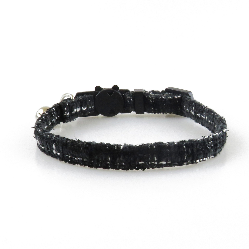 Black textured cat collar without bow, showing the adjustable band