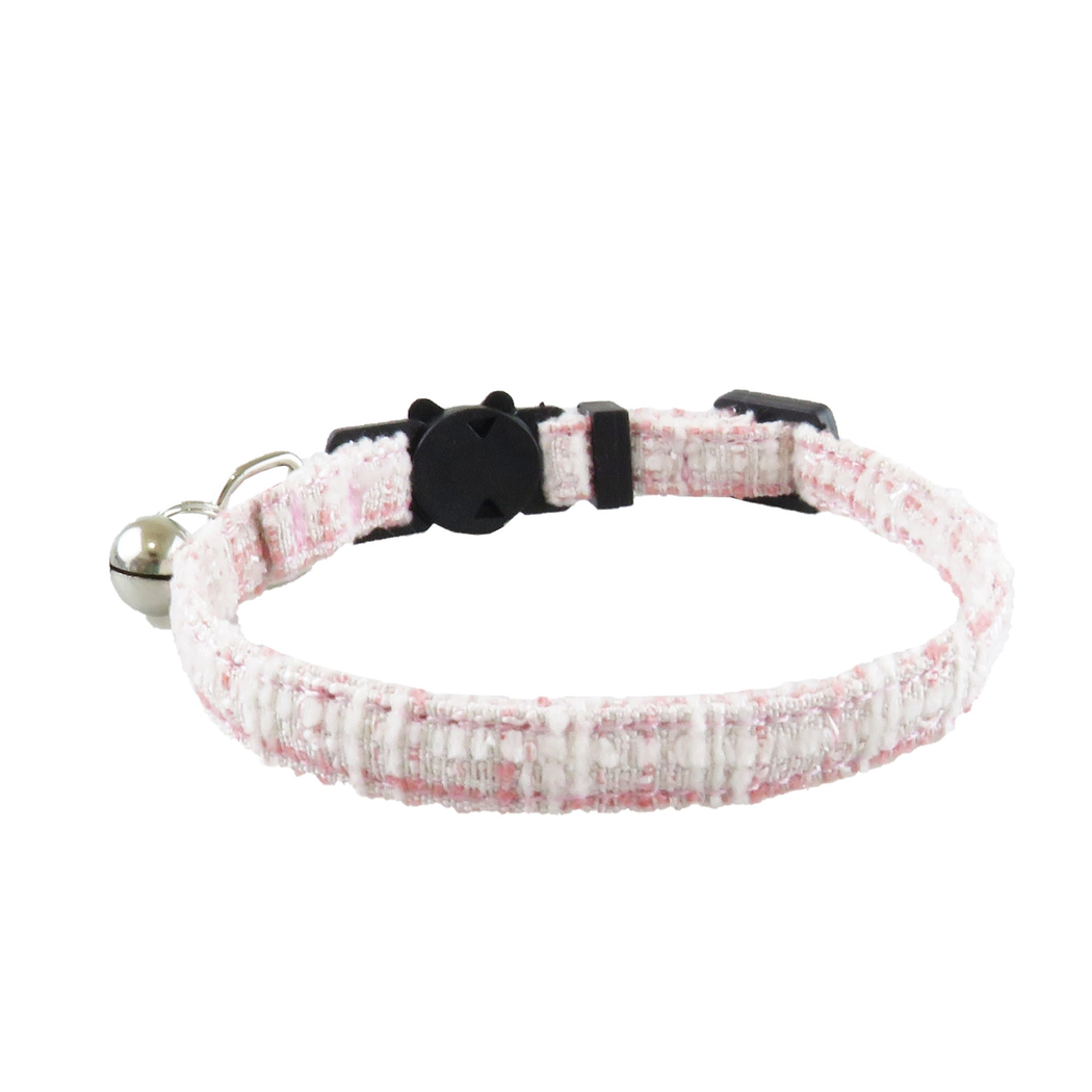 Light pink textured cat collar without bow, showing the bell and adjustable band