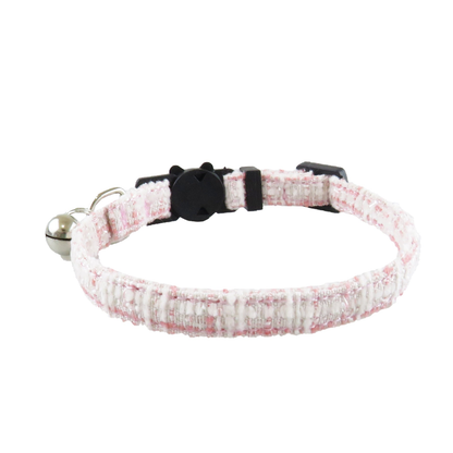 Light pink textured cat collar without bow, showing the bell and adjustable band