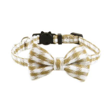 Tan and white houndstooth cat collar with matching bow, front view