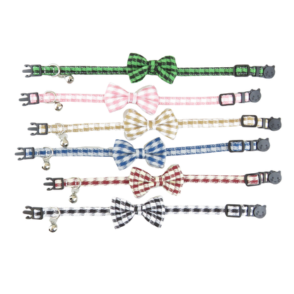 Six houndstooth cat collars with bows laid flat in assorted colors