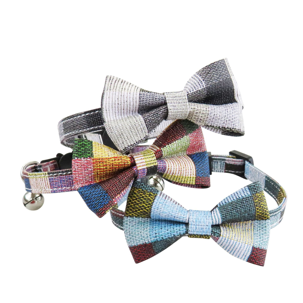 Three patchwork bow cat collars displayed together