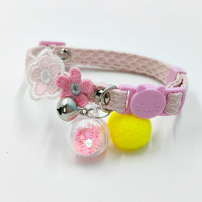 Light pink flower cat collar with cat-face buckle, bell and clear star-filled charm