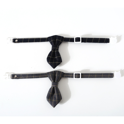 Two plaid necktie cat neckwear styles laid flat to show the adjustable straps