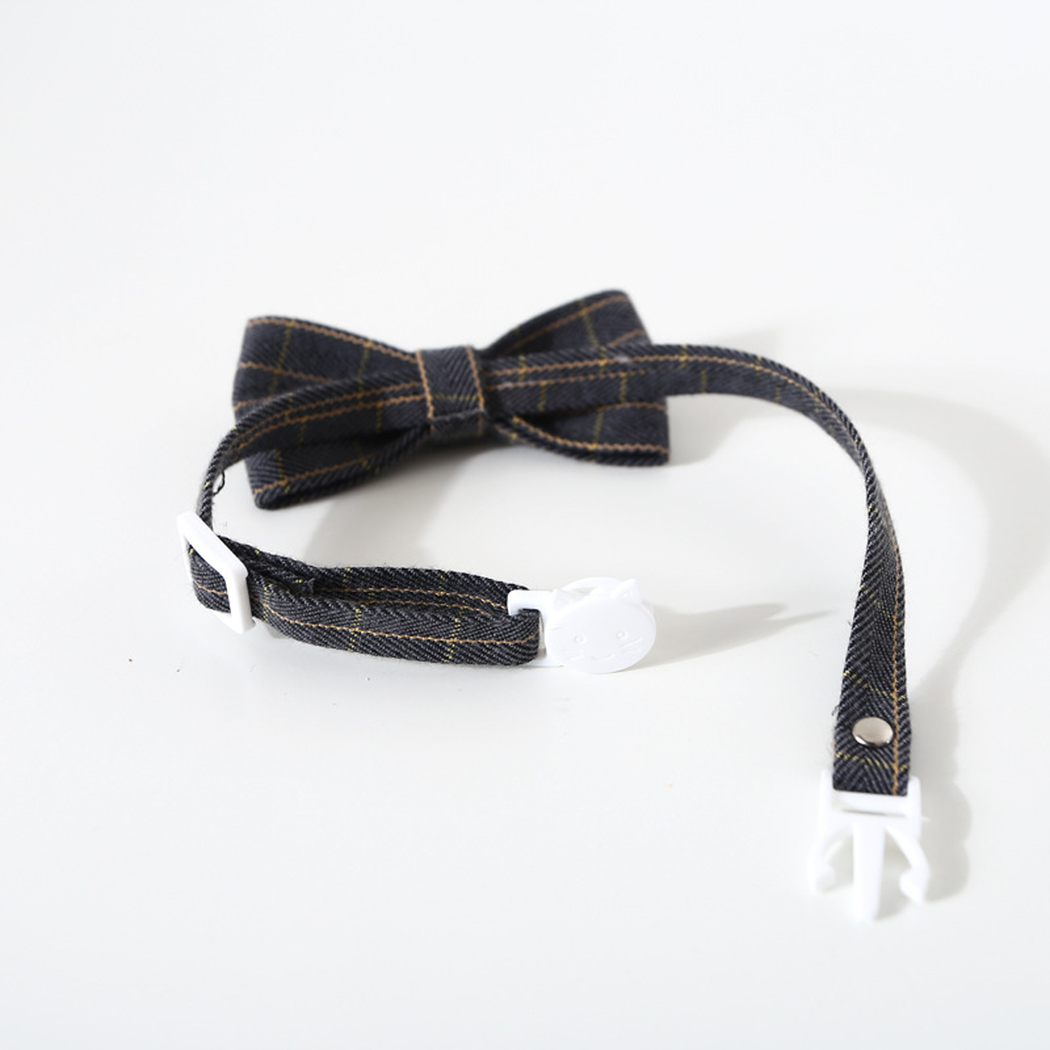 Plaid bow cat neckwear opened to show the clasp and adjustment slider