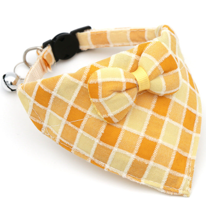 Yellow and orange plaid cat neckwear with centered bow