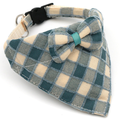 Dark teal and cream plaid cat neckwear with centered bow
