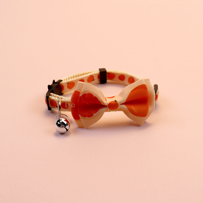 Orange fruit-print cat collar with bow and bell